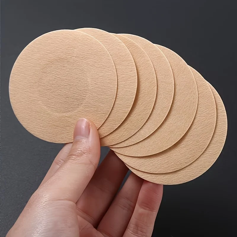 Ultra-Thin Disposable Nipple Covers, Made of Breathable Non-Woven Fabric, Anti-Bump Design, Round Shape, Seamless Fashion Accessory, Suitable for Clothing, Swimsuits, and Wedding Photography