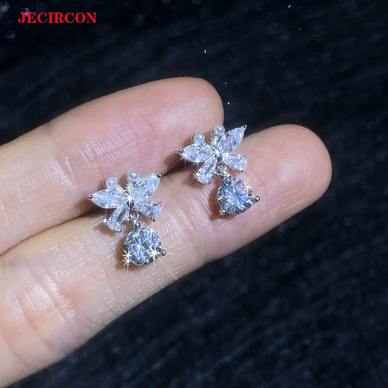 

Женские серьги-бабочки JECIRCON из стерлингового серебра 925 пробы с муассанитом 0,5 карата, элегантные изящные сверкающие универсальные ювелирные изделия-гвоздики