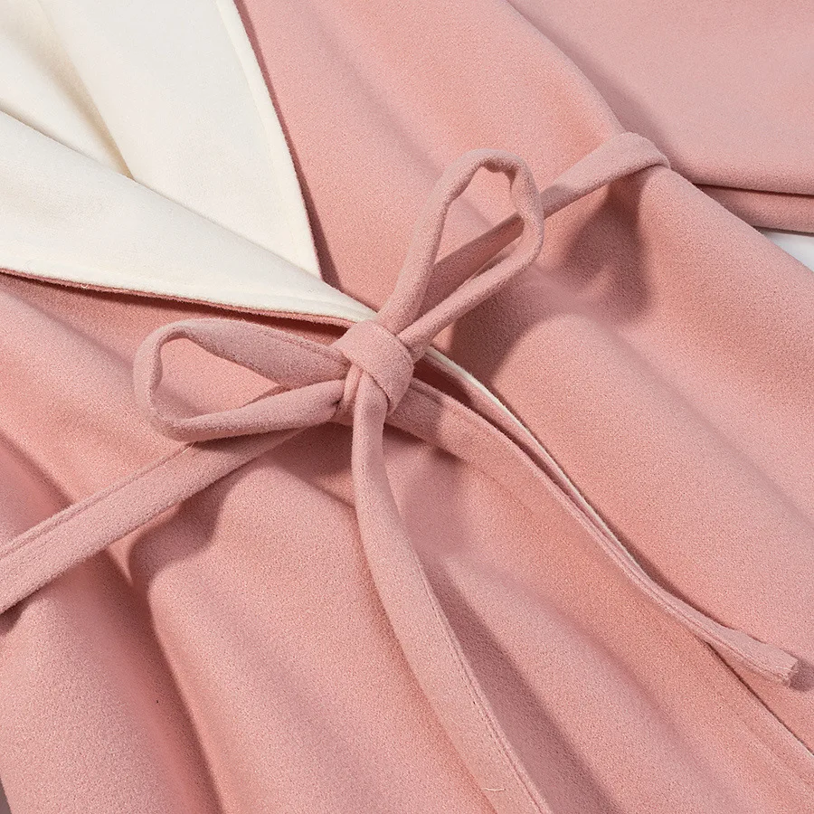 Nueva ropa de mujer europea y americana de otoño e invierno, temperamento femenino, puños peludos, chaqueta de abrigo de lana, 2025