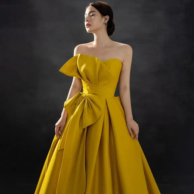 

Yellow boobs will be new birthday Quinceanera banquet host piano performance dress