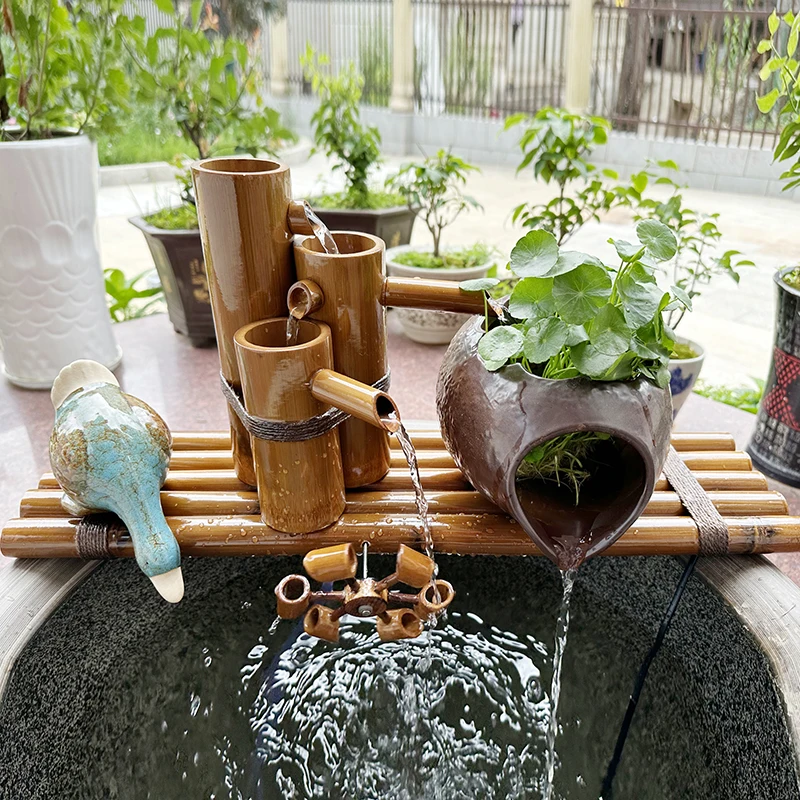 

Bamboo water flow device Bamboo tube running water fish basin filter Feng Shui wheelchair lucky ornament Stone trough fountain