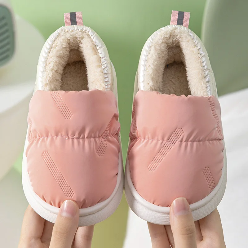 Pantofole in cotone per bambini borsa invernale tacco impermeabile antiscivolo medio ragazzi/ragazze spessa suola morbida velluto caldo scarpe in cotone per bambini