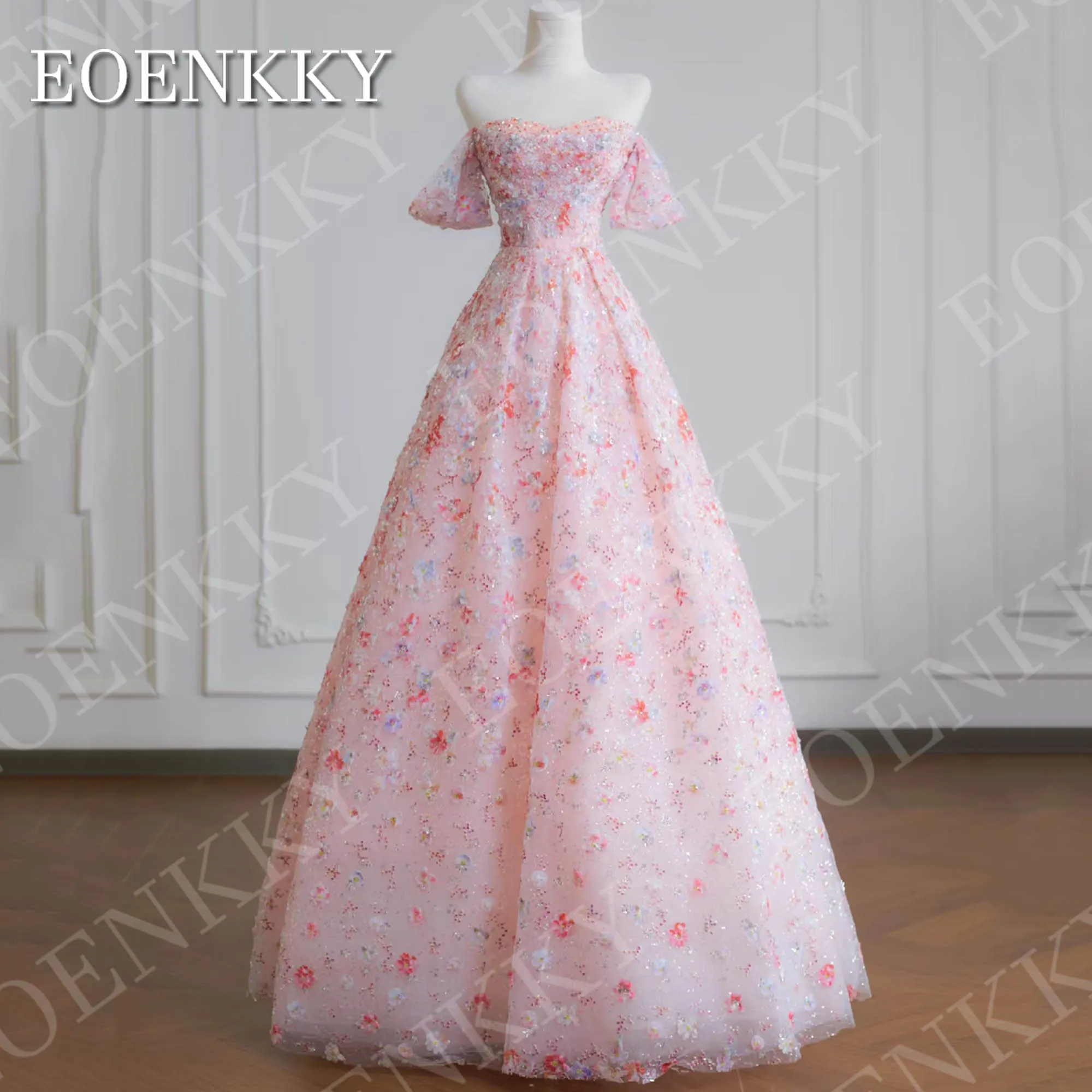 

EOENKKY Customized Pink Off Shoulder Tulle 2026 Prom Dress 3D Floral Sparkly Sequin A Line Graduation Dresses فساتين حفلة موسيقي