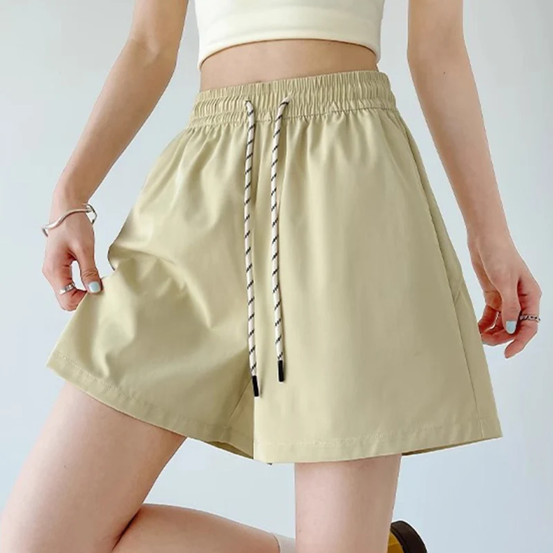 

Летние быстросохнущие шорты с высокой талией для женщин 2025 Корейские однотонные спортивные шорты на шнуровке Женские широкие свободные тонкие короткие брюки Feamle