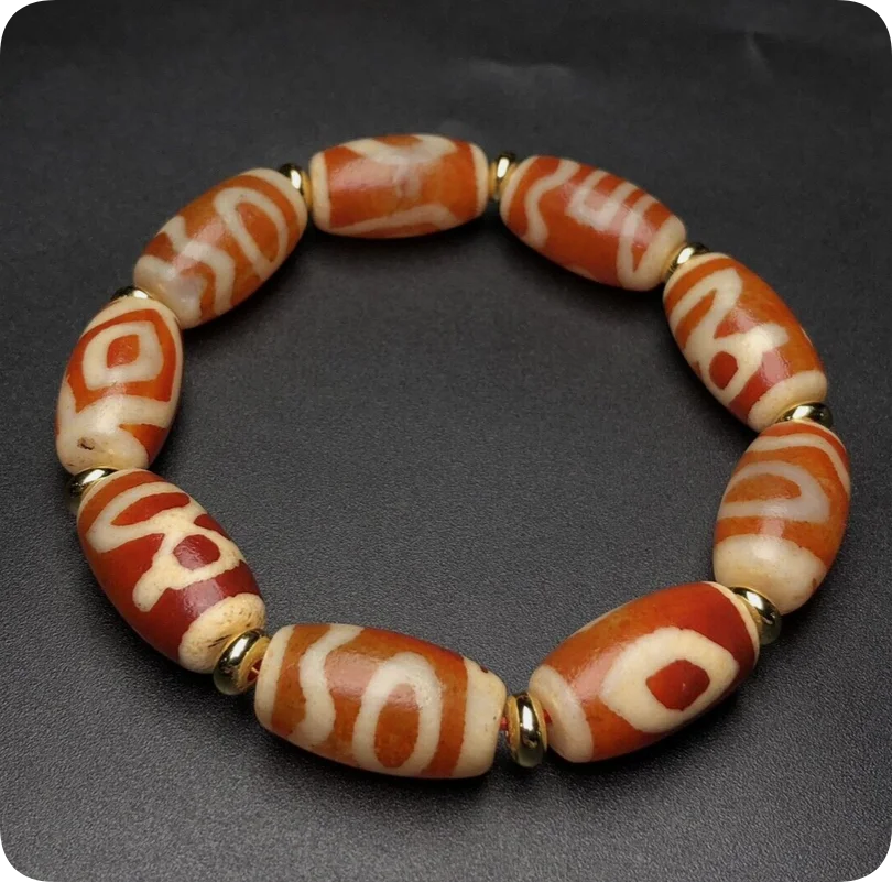 Tibetan Red Meat God of Wealth with Two Eyes Dzi bead Agate 11 * 19mm