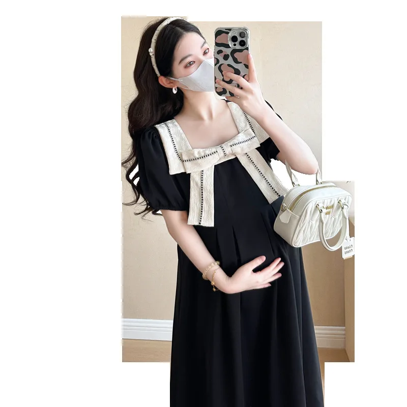 الأمومة فستان أسود صغير الصيف جديد القوس لهجة التباين تقليم ألف خط فستان العمل سليم صالح فستان جذاب للنساء الحوامل