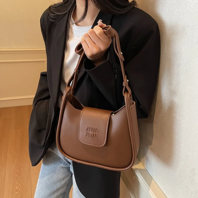 

Elegant Leather Women's Messenger Bag High-End Luxury Elegant Lining Trendy Daily Commuter Vintage Casual Bag​