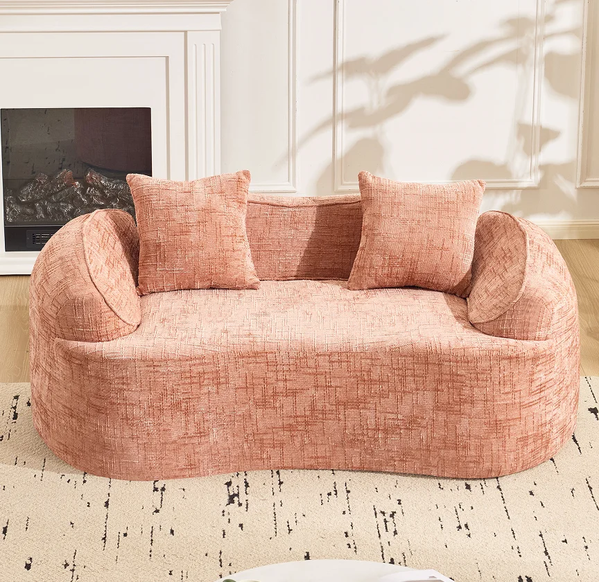 #Pink Curved Two - Person Compress Sofa. It Has Armrests On Both Sides, Comes With Two Pillows