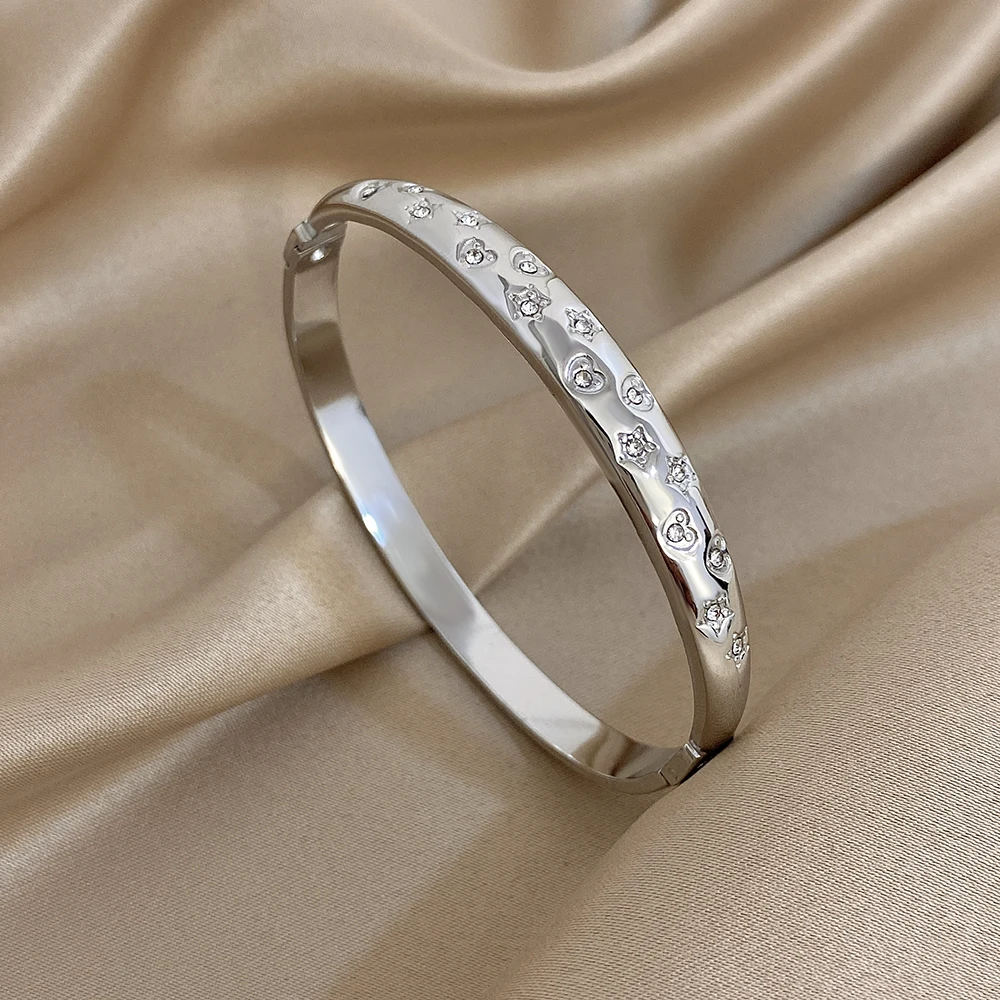 DODOHAO رائعة ستار القلب الفولاذ المقاوم للصدأ الإسورة سوار للنساء 2026 موضة مقاوم للماء الكفة المستديرة الإسورة مجوهرات الحفلات