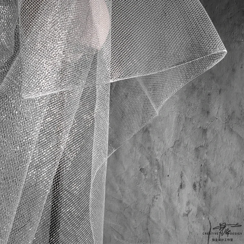Nuevo Material de forma de tela de hilo duro metálico plateado brillante, malla de alambre de acero de imitación, tela de diseñador con rombos, costura Diy