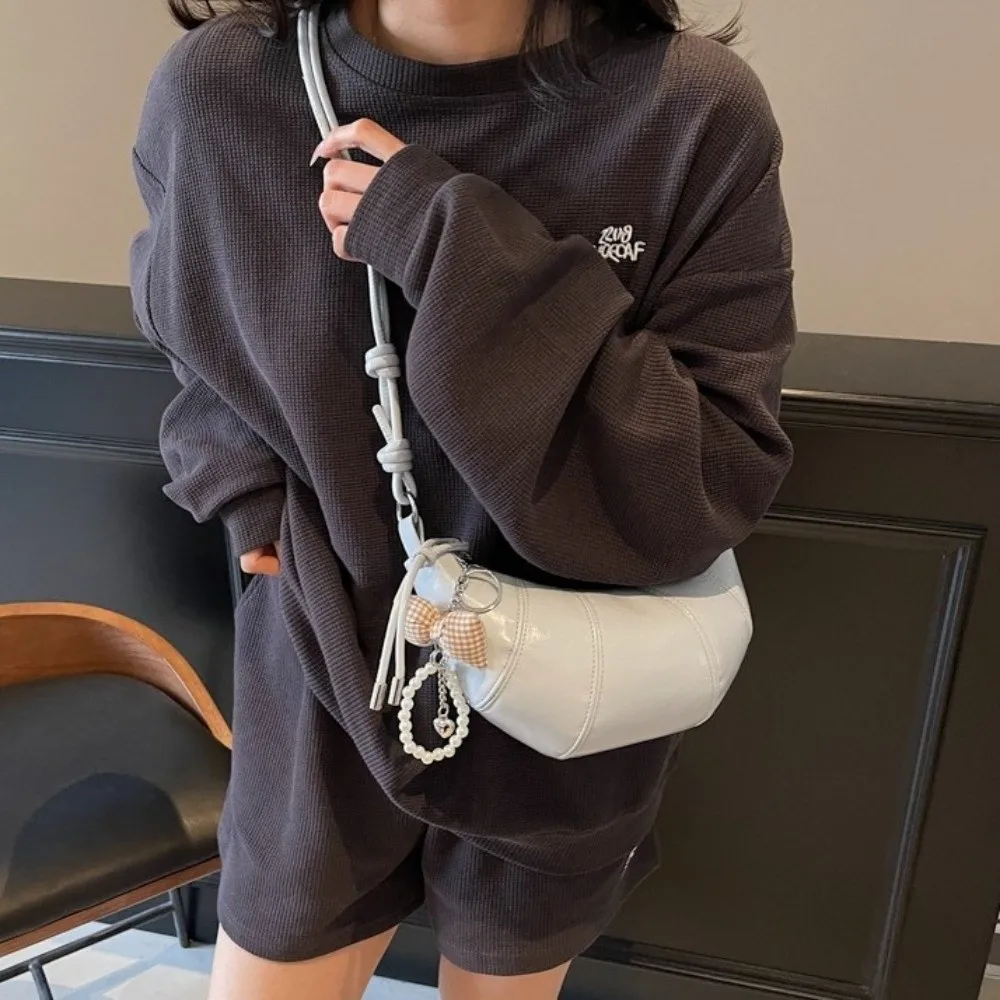 

Elegant Croissant Shoulder Bag Bowknot Pearl Pendant PU Leather Underarm Dumpling Bag Korean Style Solid Color Crossbody Bag