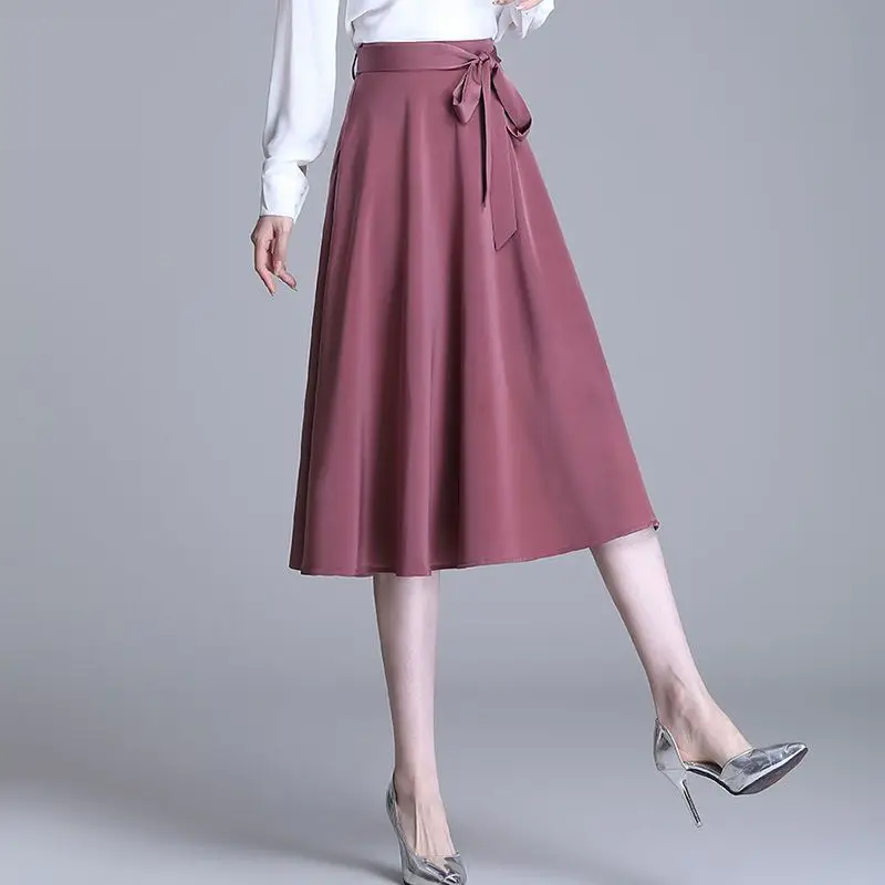 

2025 Autumn New Office Lady Simplicity Lacing High Waist A-line Skirt Ladies Korean Fashion Bow Solid Color Pleated Skirt Women