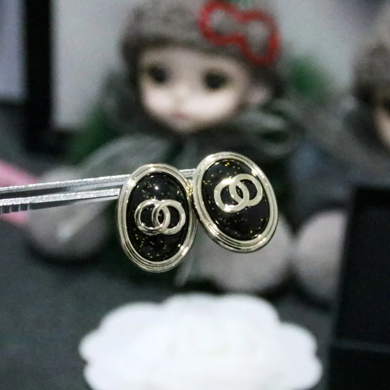 

3073 Black Resin Oval Light Luxury Fashion High-end Versatile Double C Letter Stud Earrings