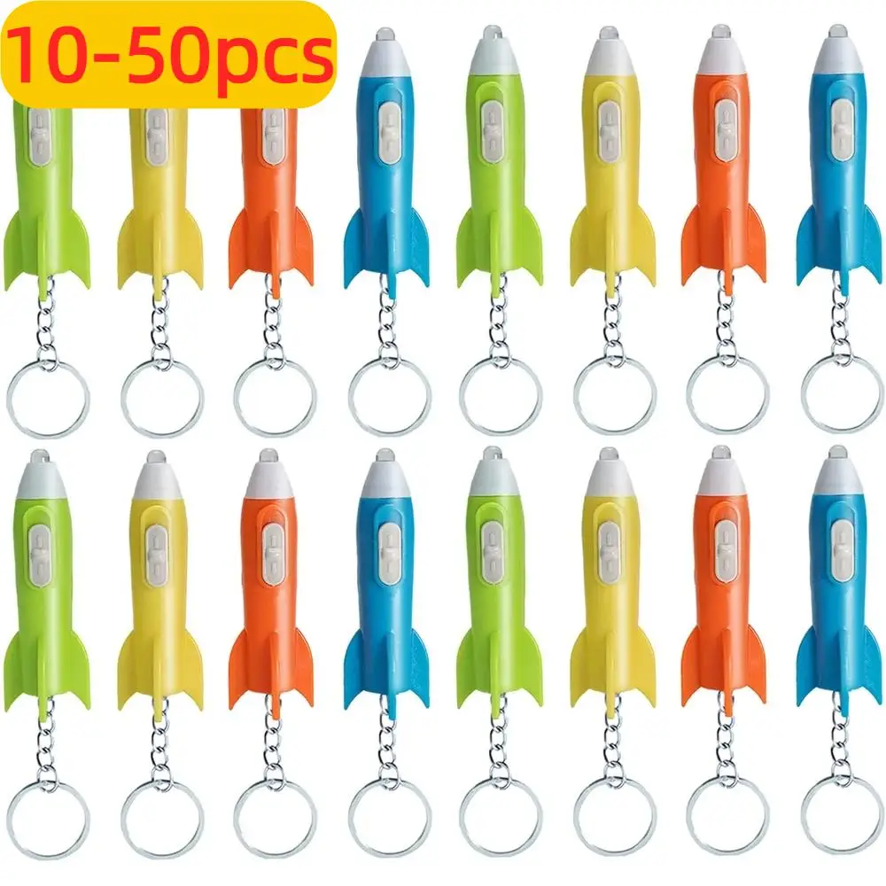 10-50 Uds linterna de dedo llavero de cohete llavero espacial LED Mini linterna llavero cohete de plástico llavero fiesta niño