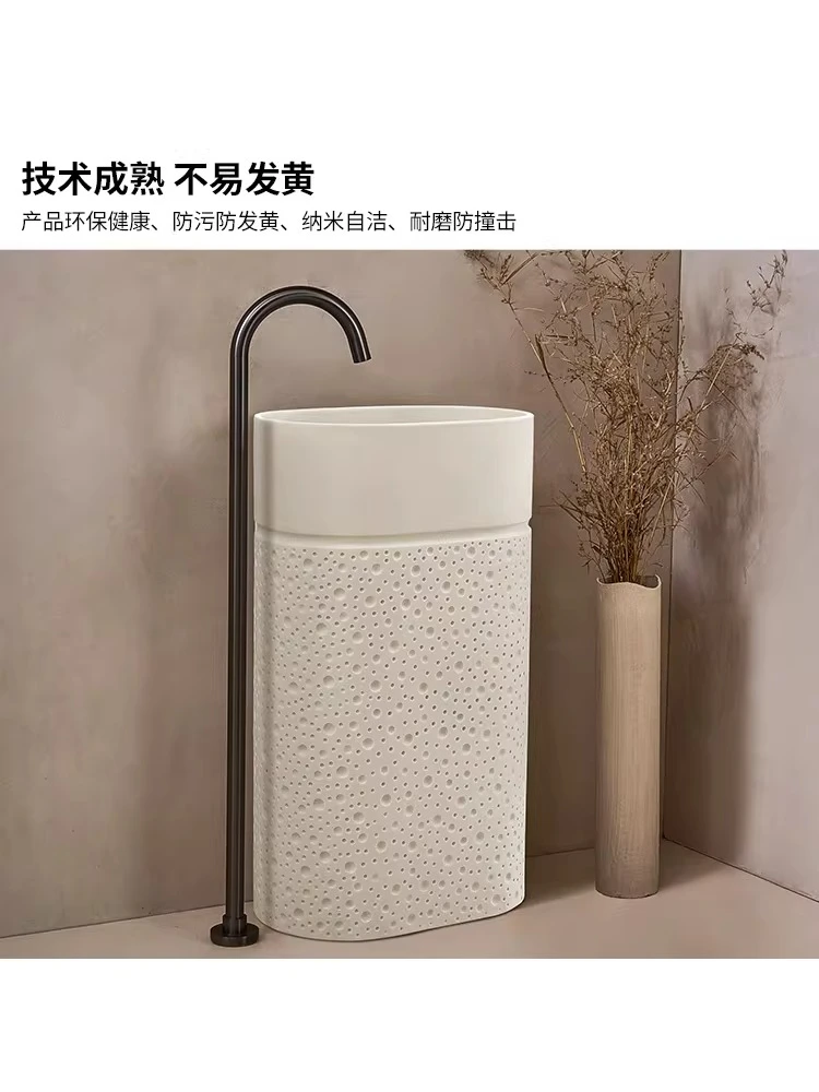 

Japanese-style wabi-sabi cream wind column basin oval integrated floor type artistic creativity personalized face wash table