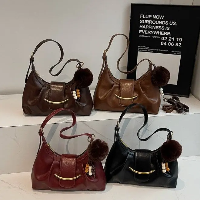 

Новая универсальная женская сумка-кроссбоди 2026 года, нишевая ретро-сумка-тоут на плечо, модная сумка-багет