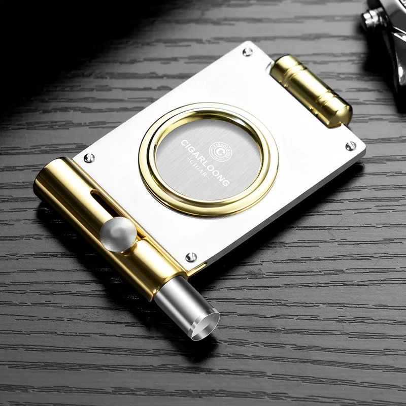 

Сдержанный резак для сигар — скрытая гильотина в элегантном кольце, идеально подходит для мероприятий и подарков