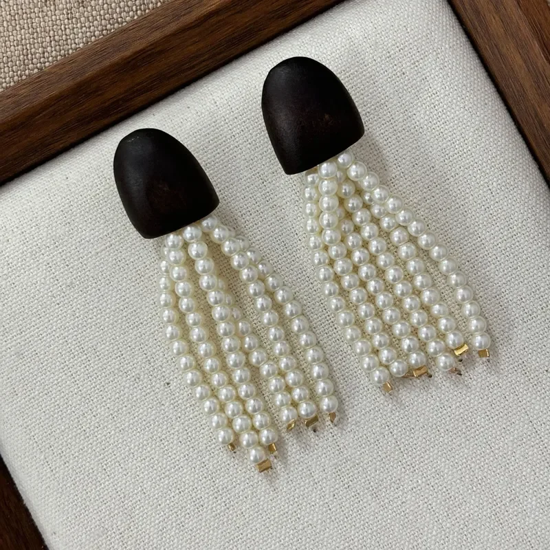 Retro log multi-layer pearl fringed earrings long face small French temperament niche design earrings wholesale
