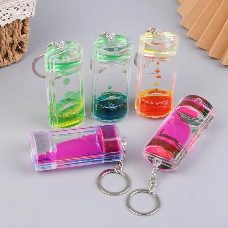 Porte-clés avec minuterie de liquide dynamique, barboteur de mouvement coloré, sablier, décor de charme pour sac