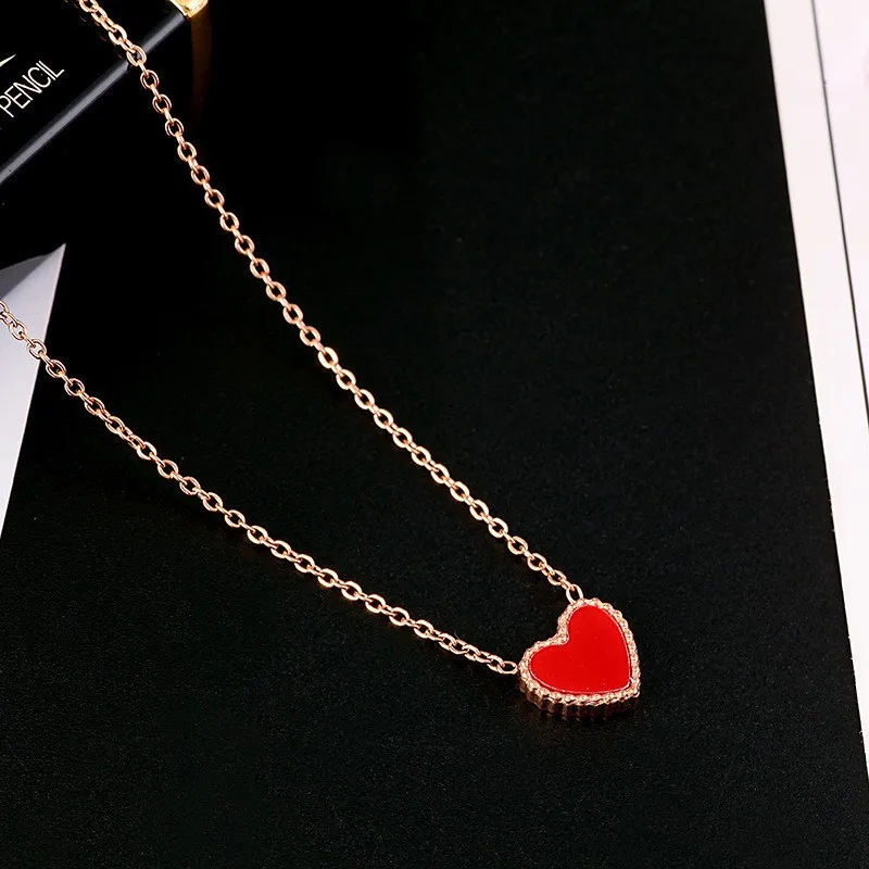 Double-sided heart-shaped love pendant titanium steel necklace female plated 18K rose gold collarbone chain fashion hundred with