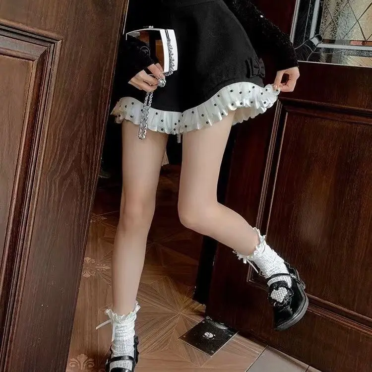 Large size European lace ruffle edge black shorts women's autumn and winter high waist and thin A-shaped wide-leg pants
