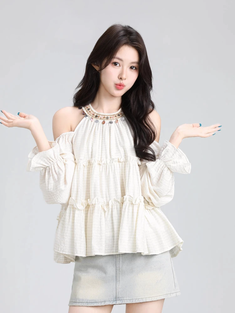 

French holiday style halter neck off-shoulder long-sleeved shirt female 2025 new design niche wood ear edge loose top