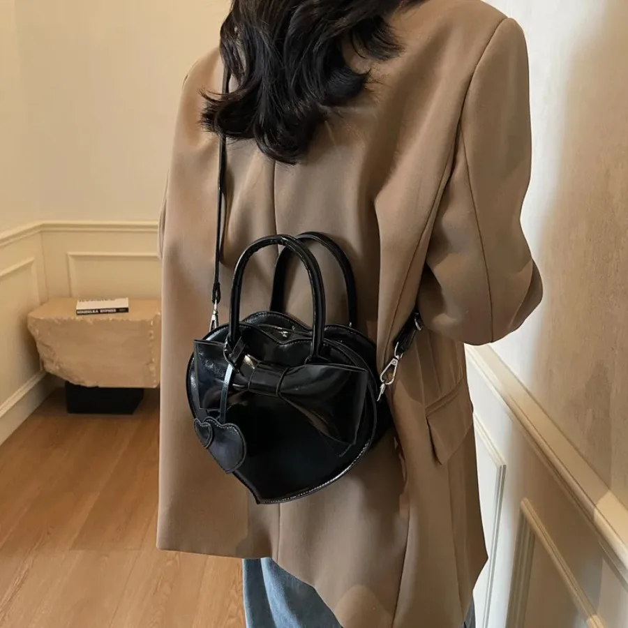 

Новая летняя модная нишевая сумка через плечо с бантом на весну и лето, универсальная простая женская сумка через плечо с пряным сердцем