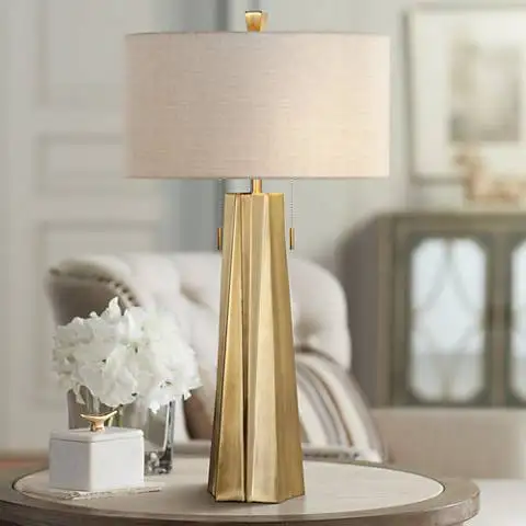 Lower Town Park in New York imports For uttermost Maress Comet trailing golden atmospheric table lamp