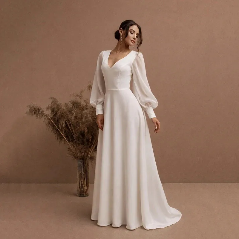 

Simple A-Line Ivory Long Sleeves Wedding Dresses Sexy Deep V-Neck Backless with Button Floor-Length Bridal Gowns 2026 Customized