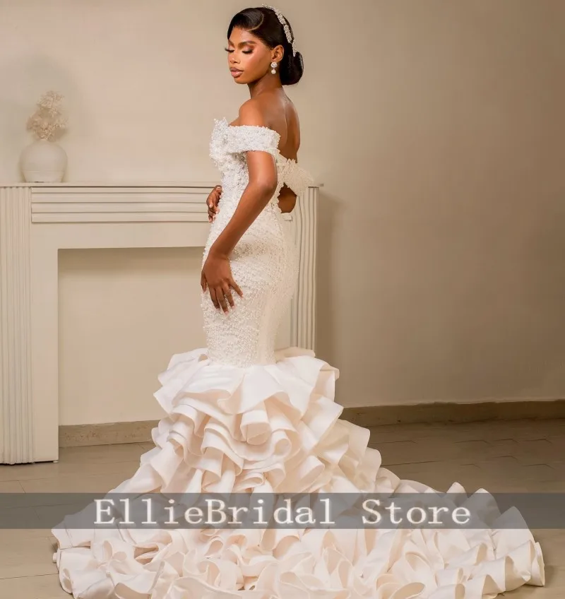 فساتين زفاف رائعة على شكل قلب مكشكشة لؤلؤ حورية البحر للفتيات قبالة الكتف فساتين فيستدو دي نوفيا 2026 مخصصة #1