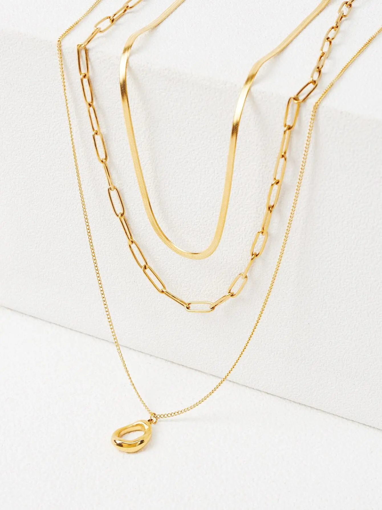 

Набор из 3-х золотистых многослойных ожерелий с геометрическими подвесками и цепочками