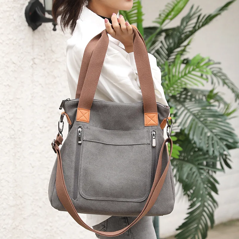 

Color matching canvas single shoulder travel backpack large capacity zipper multi-function hand tote bag for women