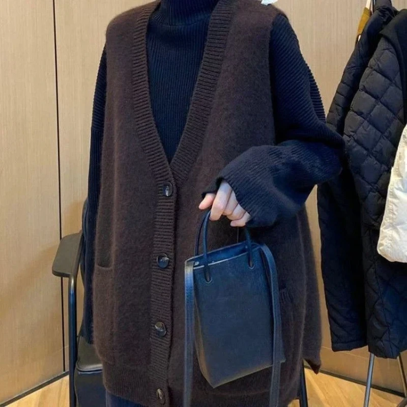 Outono e inverno novo colete de malha casual cardigan versão coreana da moda com fundo solto sem mangas colete