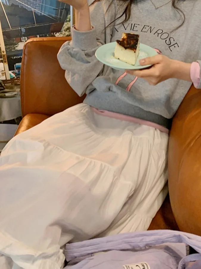 Gonna longuette a trapezio chic a vita alta per donna Gonna lunga in puro colore Stagione primaverile Dolce Sle Finiture in legno Dimagrante versatile
