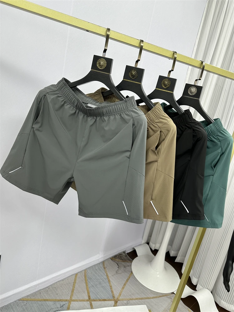 

Легкие дышащие эластичные быстросохнущие спортивные шорты из ледяного шелка с лазерной перфорацией для активного отдыха, длина до колена