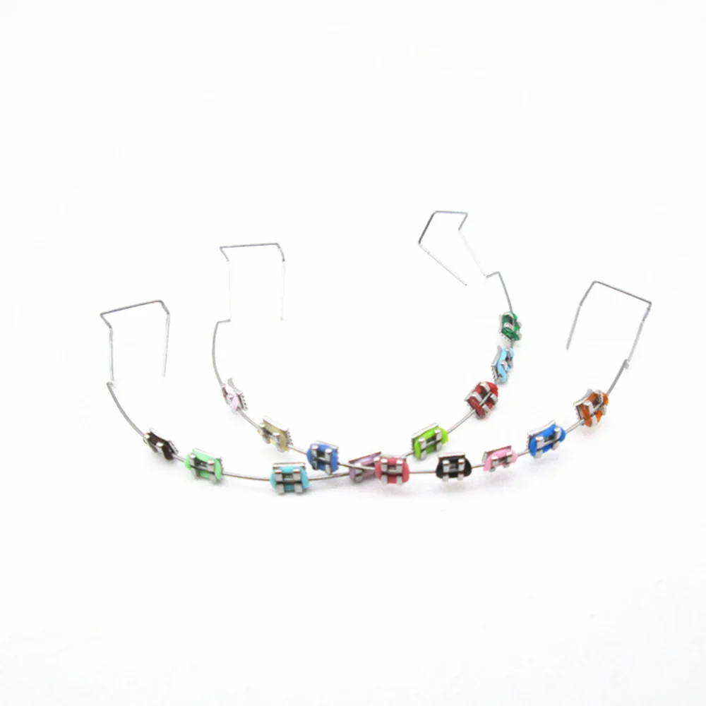 

1 pair Colorful Temporary Tooth Decoration Dental Decorations Fake Brackets Orthodontic Ligature Ties Braces with Metal Wires