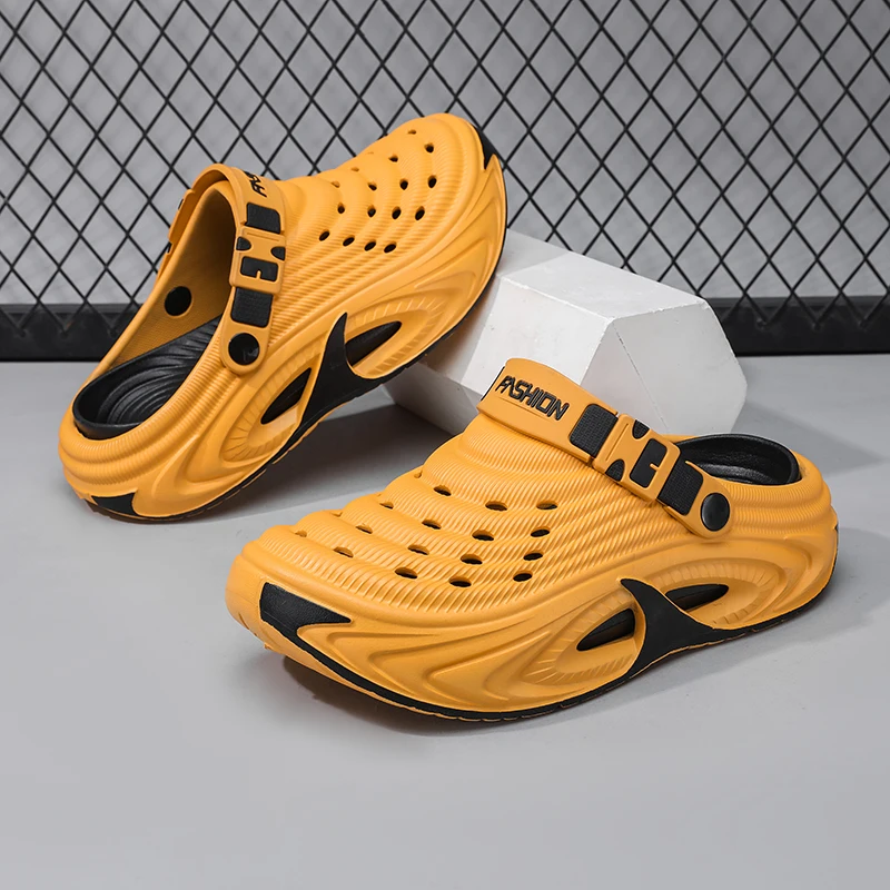 A pair of teens color block EVA closed toe clogs full breathable holes lightweight cushioned outdoor shower sandals LZ-26014