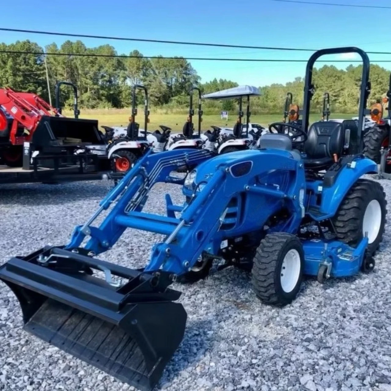 ركوب جرار جزازة العشب مع الجرافة الأمامية 4WD 4x4 محمل جزازة العشب #1