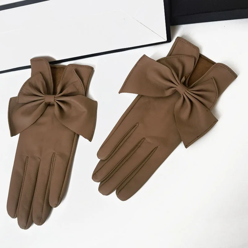 Guantes de piel de oveja auténtica para mujer, decoración de lazo, estilo fino, negro y marrón, invierno, nueva moda