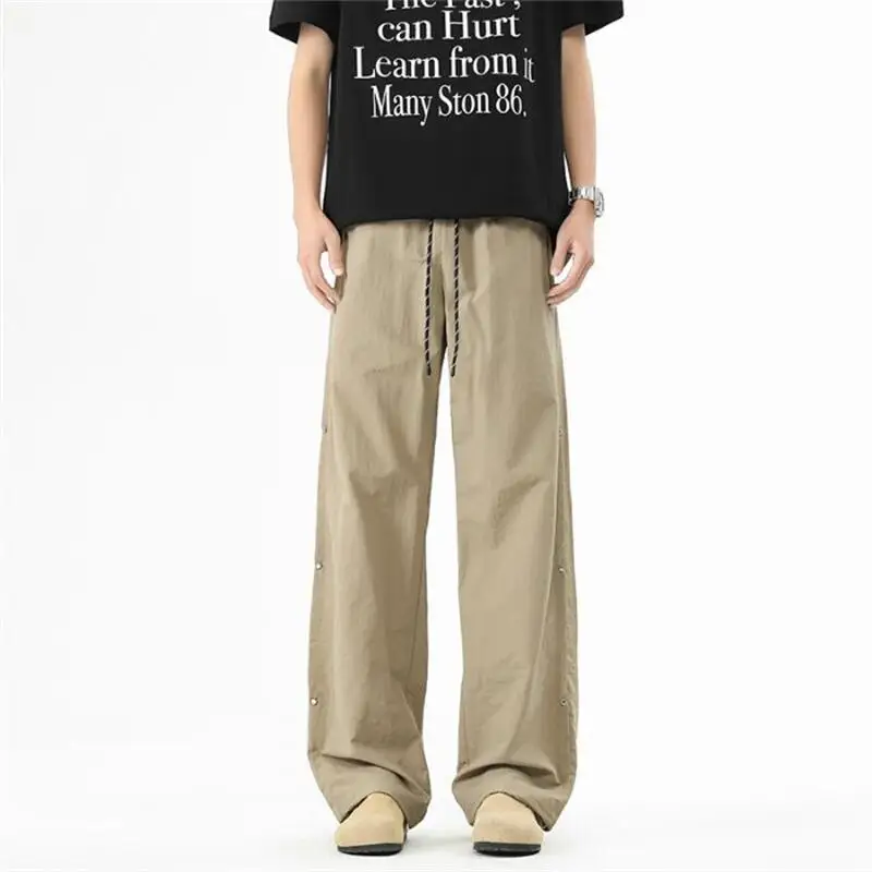 

Men's Spring And Autumn Sports Trend Brand Loose Work Pants Versatile Straight Tube Paratrooper Drawstring Charging Casual Pants