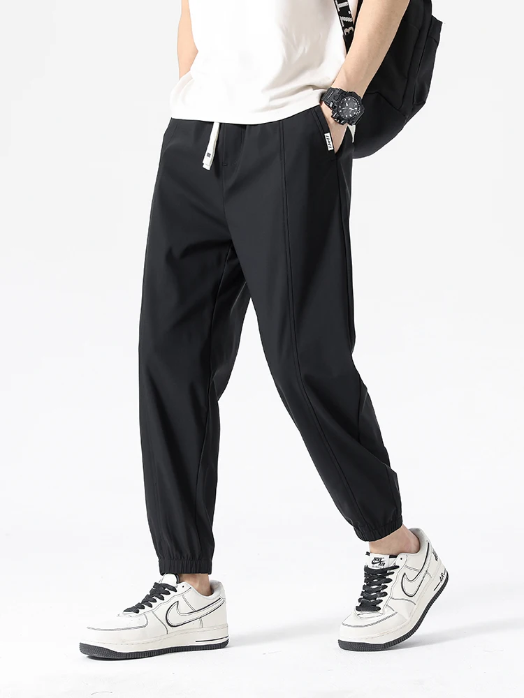 

Мужские повседневные брюки весна-лето, тонкие, свободные, из ледяного шелка, с манжетами, прямого кроя, быстросохнущие, спортивные, модные, городские, стильные