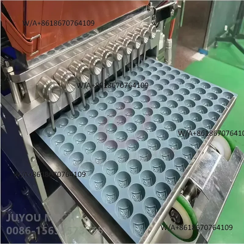 The newly designed fully automatic manual model acid tape making press hard boiled fruit candy making machine comes from