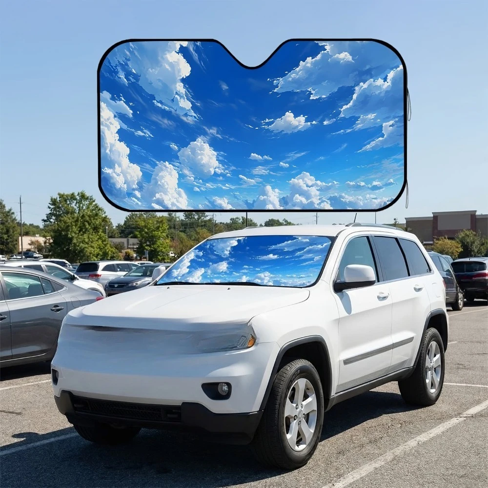 Blue sky, white clouds, and clear sky with vast expanse of clear skies. Front window sunshade and sunshade shield