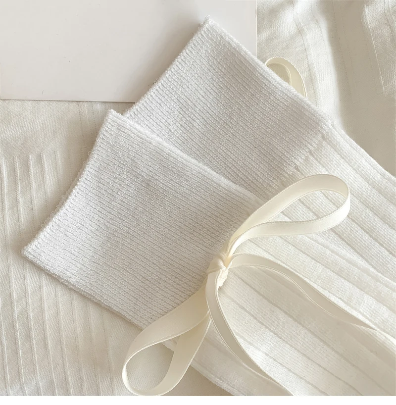 Calzini lunghi da donna Calzini alti al ginocchio con fiocco in tinta unita di alta qualità femminile Brew sottili morbidi e carini calze da donna a righe comode