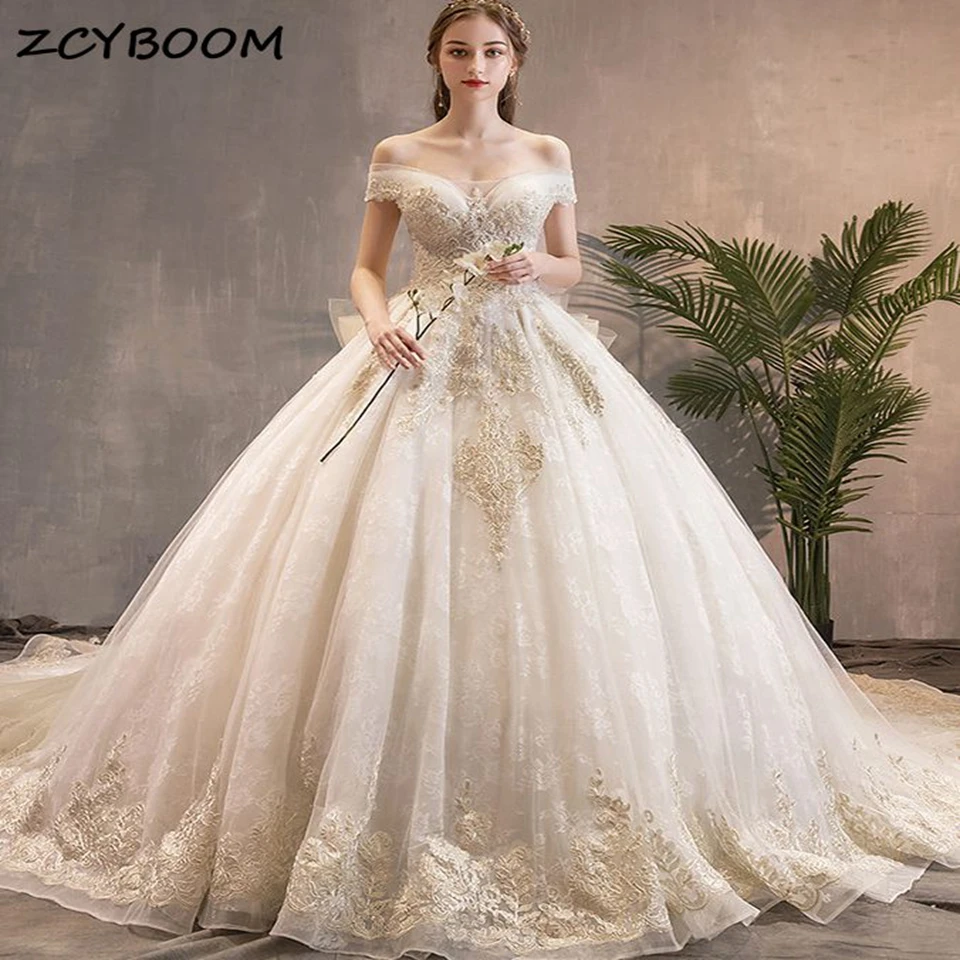 Date de luxe dentelle Appliques perlée robe de bal robes de mariée 2025 chérie dos ouvert Court Train robes de mariée principales pour les femmes