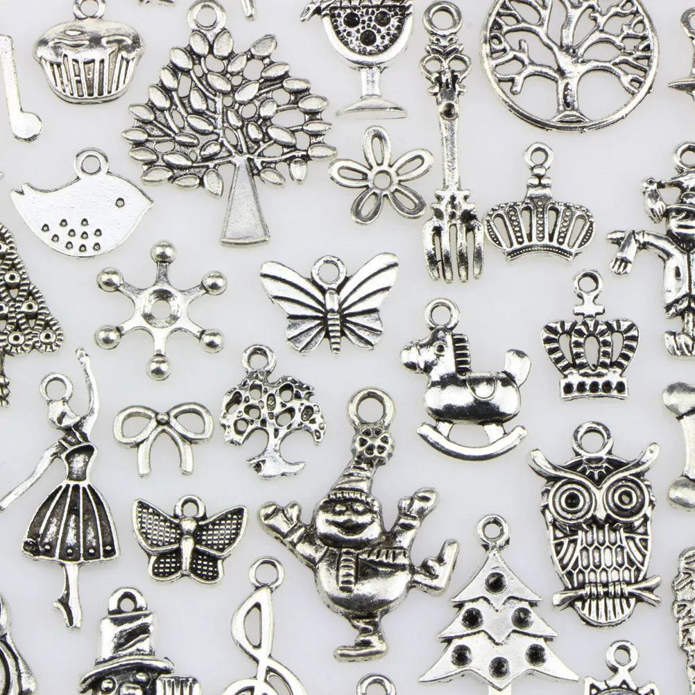 

100 Pcs Christmas Theme Pendants Alloy Jewelry Beads Accessories DIY Crafts Decoration Supplies (Mixed Send)