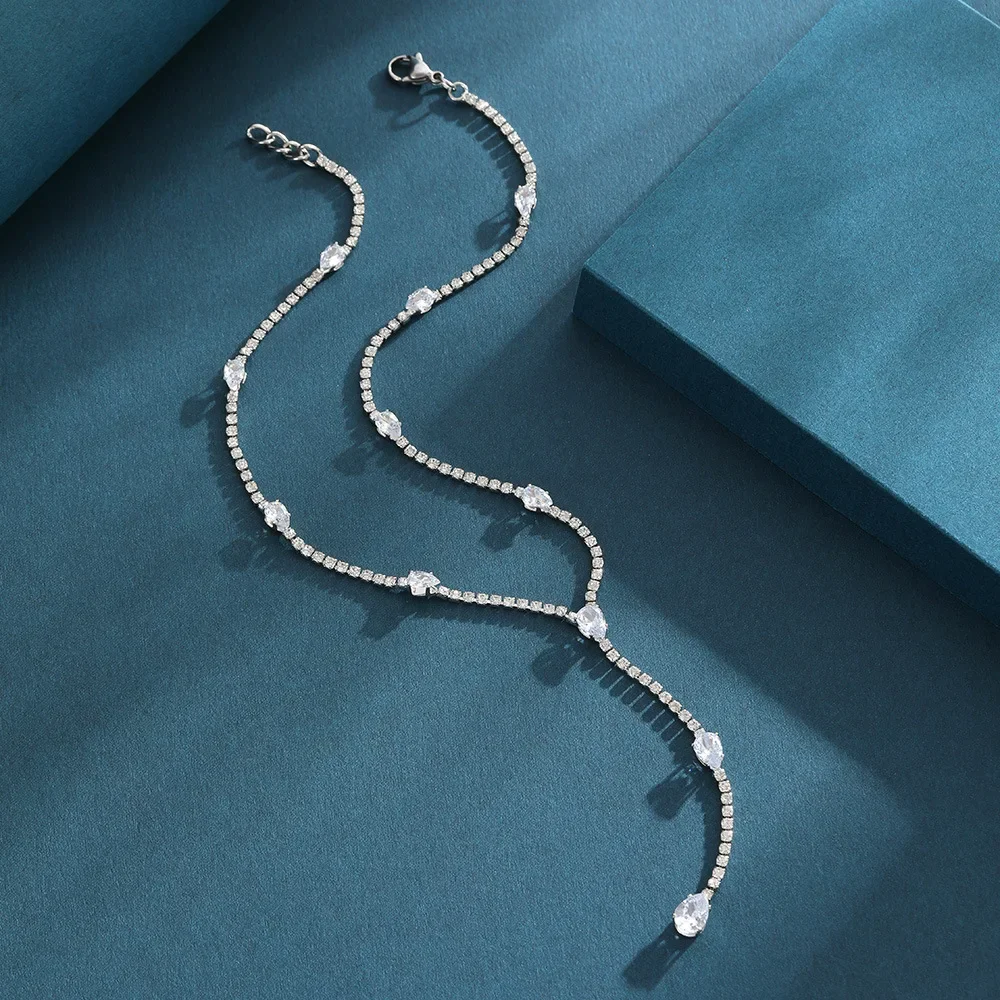 

Модная и роскошная цепочка на ключицу, инкрустированная бриллиантами, высококачественное колье с каплевидным цирконом.