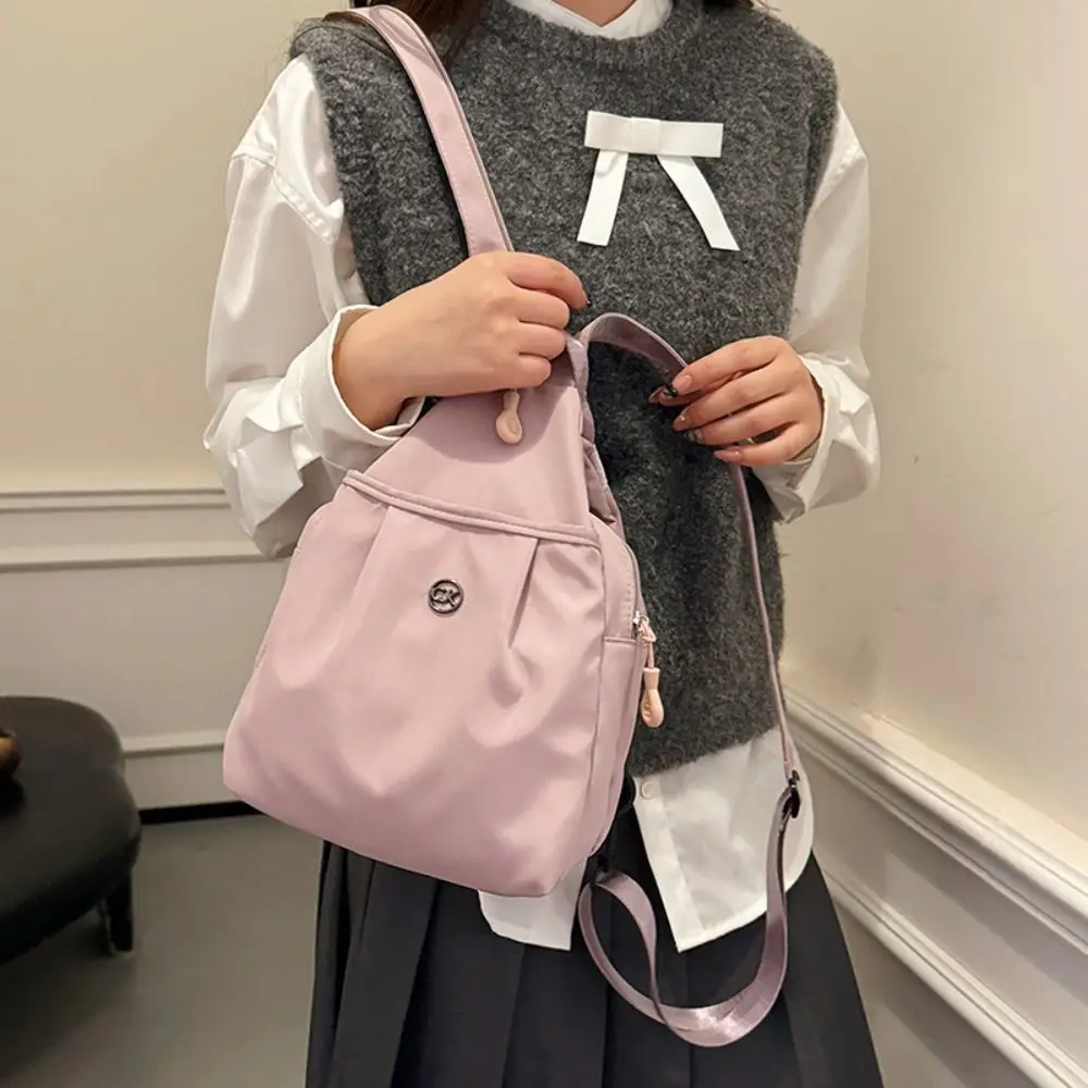 Zaino in tessuto Oxford tinta unita Borsa a tracolla casual leggera in nylon con tracolla regolabile di grande capacità
