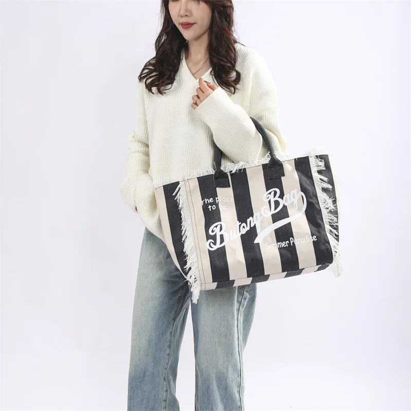 

2025 New Ladies Handbag Beach Travel Shopping Large-capacity Casual Canvas Bag Woman Fashion Striped Tassel Handheld Tote Bag