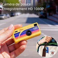 Mini llavero retro Cámara de pulgar 1080P HD Grabadora Flash incorporado Enfoque automático 130 °   Cámara portátil con pantalla LCD TFT y lente gran angular